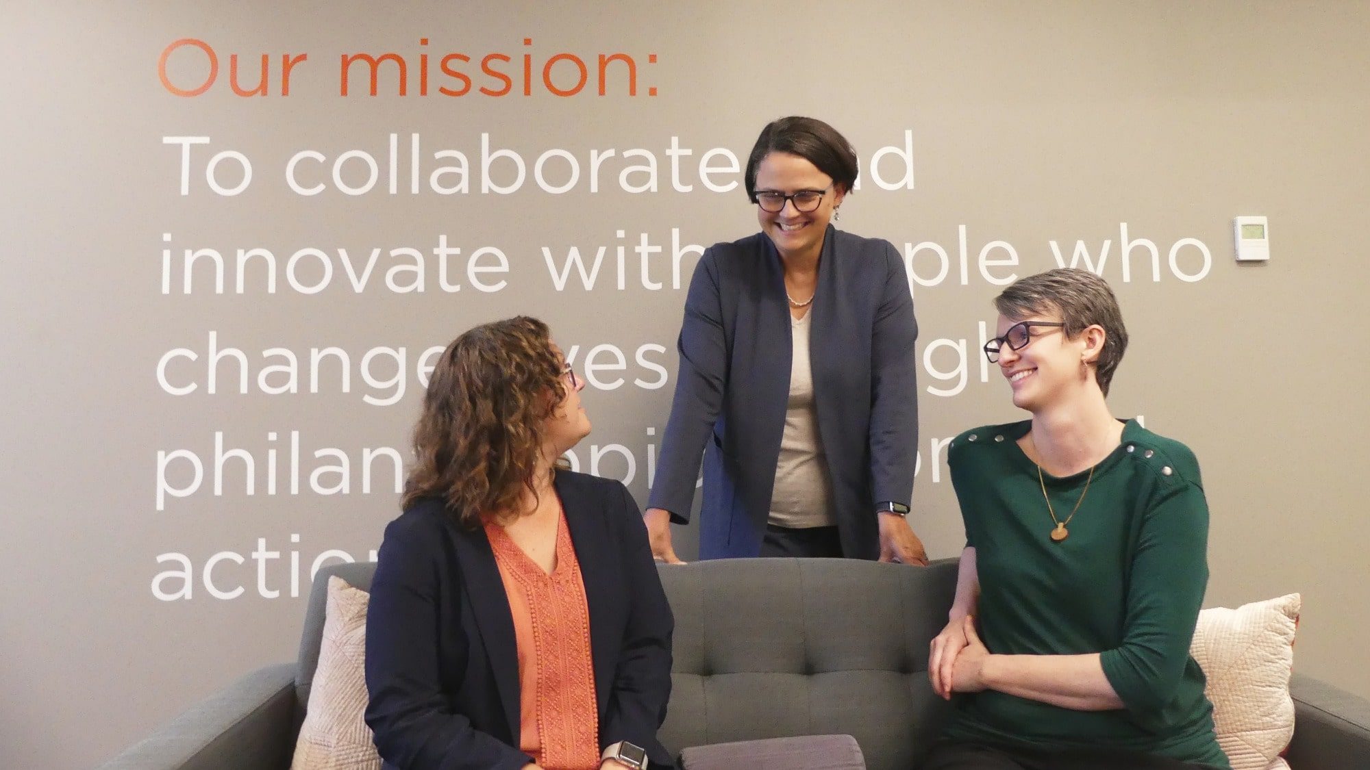 Campbell Copresident Kate Roosevelt (center) solicits input from employees before making decisions